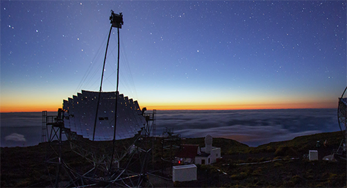 A radio telescope at nighttime 